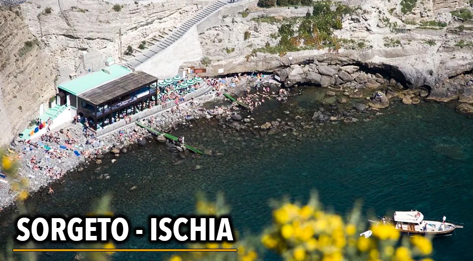 Picturesque cliff view near Thermal Spring of Sorgeto Bay, Ischia Island, Italy.